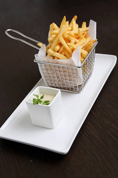 french fries with sauce stock photo