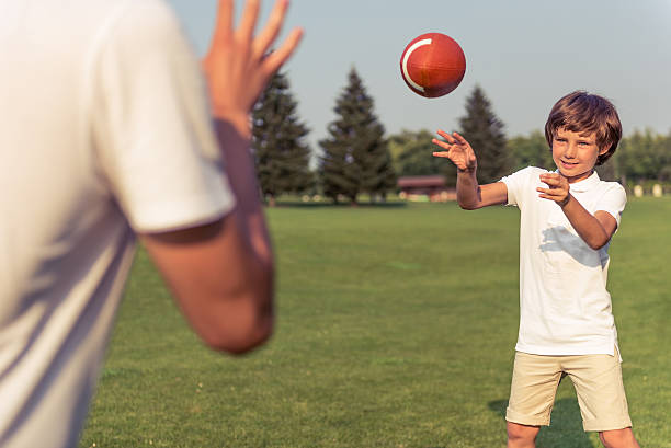 istock Dad and son resting outdoors 546439692