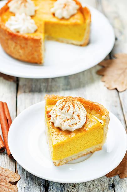istock pumpkin pie decorated with whipped cream 546442808