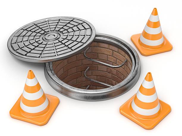 Open manhole and traffic cones. Under construction concept. 3D Open manhole and traffic cones. Under construction concept. 3D render illustration isolated on white background sewer lid stock pictures, royalty-free photos & images