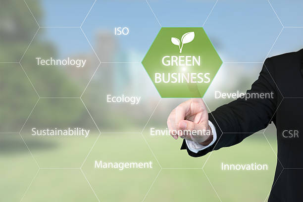 istock Business man working with virtual interface presentation of green business 546446568
