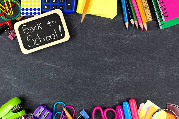 istock Back to School tag with school supplies border on blackboard 546448012