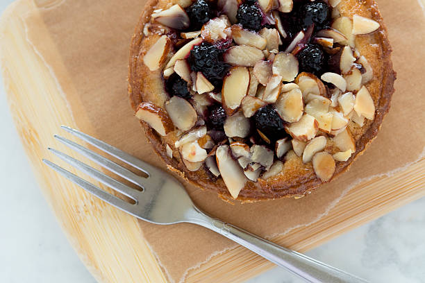 Marionberry Almond Frangipane Tart A Marionberry / blackberry almond frangipane tart. marionberry stock pictures, royalty-free photos & images