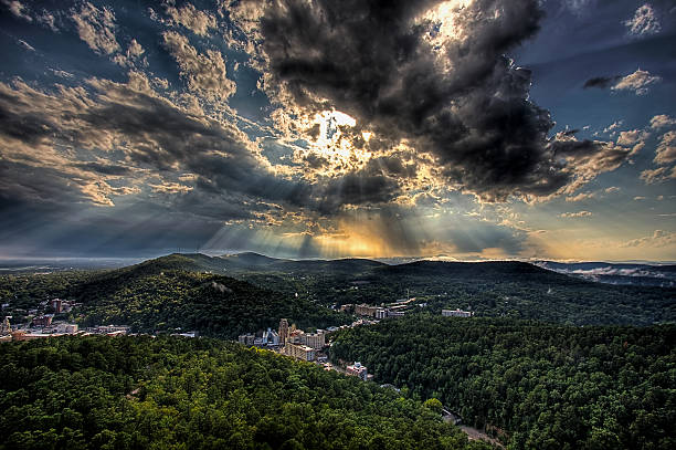 Hot Springs Sun Rays Sun Rays and Clouds over Hot Springs, Arkansas arkansas stock pictures, royalty-free photos & images