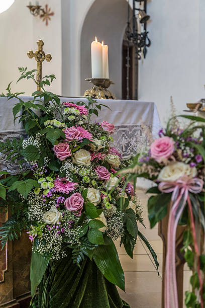 istock Church pew details with floral wedding  decoration 546454000