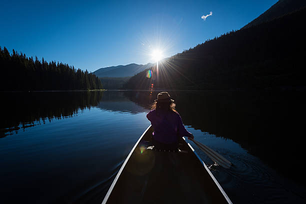 istock Sunrise canoe on a pristine lake 546454770
