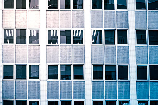 istock windows of business building 546455094