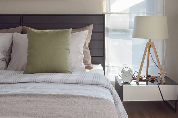 istock modern bedroom interior with green pillow and decorative lamp 546457762