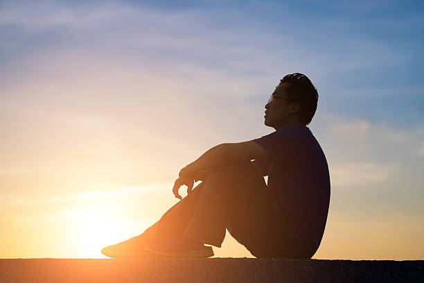 istock Silhouette of  man is looking 546458100