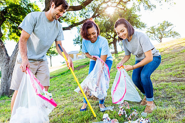 istock Friendly neighbors help with park clean up 546459786
