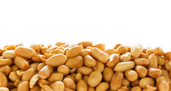 Roasted peanuts isolated on a white background