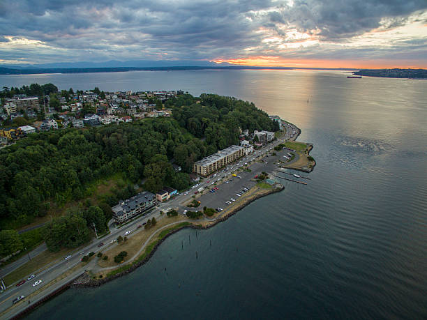 istock Aerial Above West Seattle Glowing Orange Sunset on Horizon Background 546460970