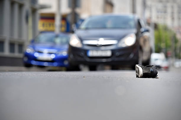 istock Shoe on the street after accident 546464362