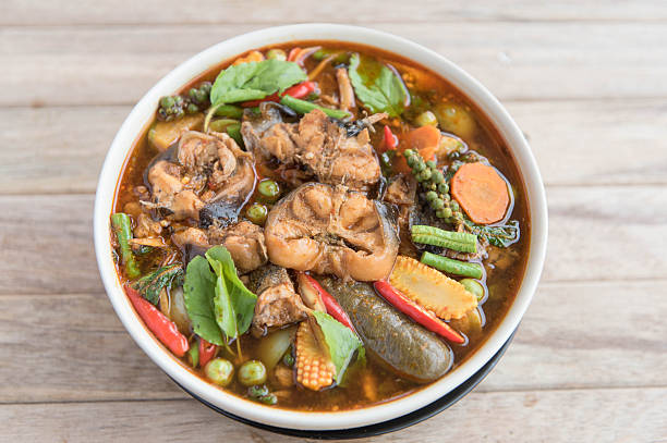 istock Spicy curry catfish with mixed vegetable,Thai style food 546465228