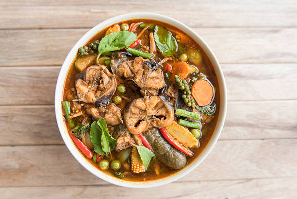 istock Spicy curry catfish with mixed vegetable,Thai style food 546465258