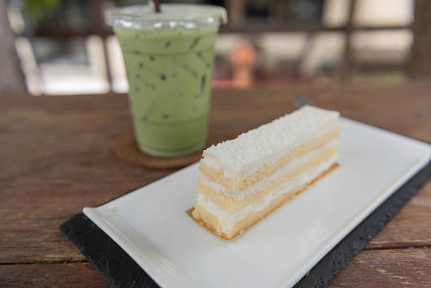 Coconut cake and milk green tea Coconut cake and milk green tea hrant dink stock pictures, royalty-free photos & images