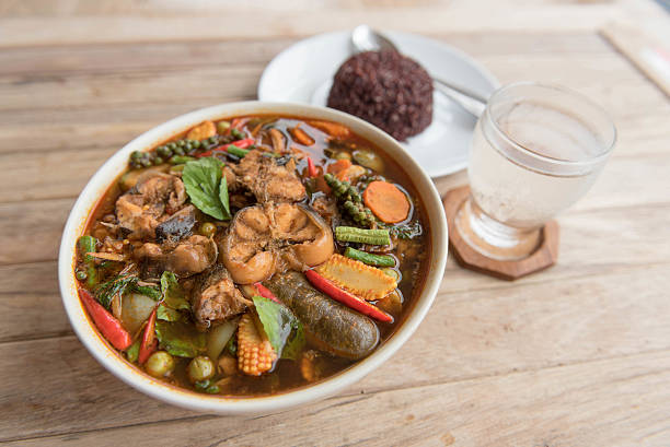 istock Spicy curry catfish with mixed vegetable,Thai style food 546465808