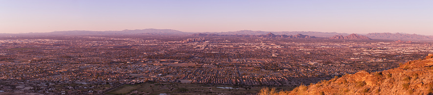 Panoramic image of The Valley of the Sun, Phoenix metropolitan area. Phoenix is the capitol of Arizona, USA, and it's downtown is visible in the middle section of the image.