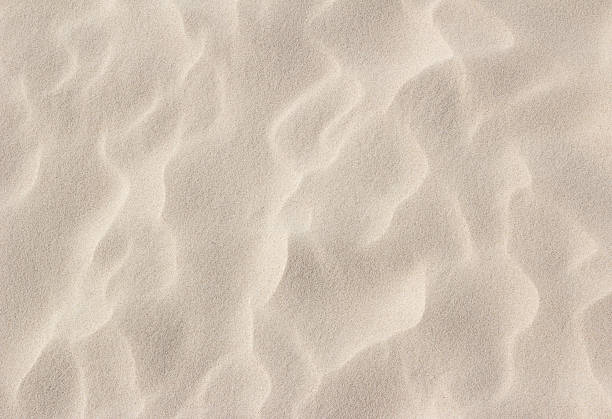 istock close up of beach sand texture background 546761210
