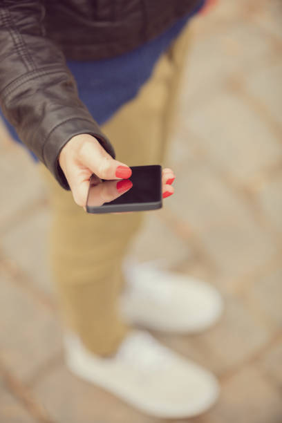 istock Urban girl using cellphone. 546770780