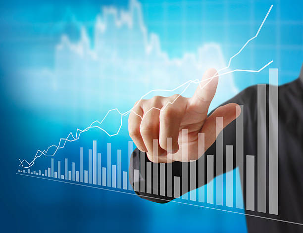 istock financial symbols coming from hand 546771492