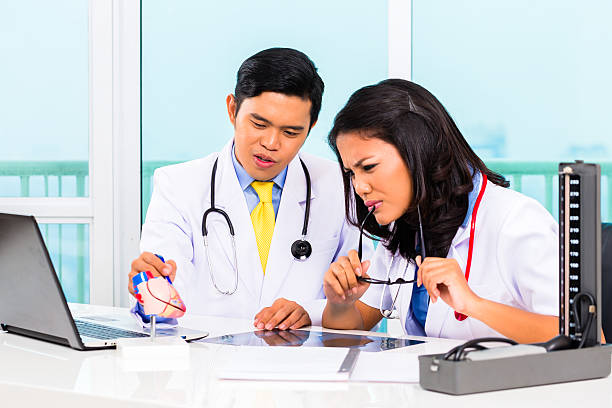 istock Asian doctor diagnosis radiograph in practise 546772956