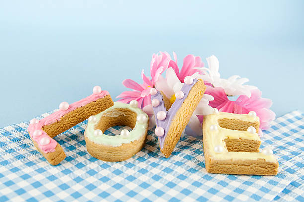 love backfround with letters of cookie - backfround imagens e fotografias de stock