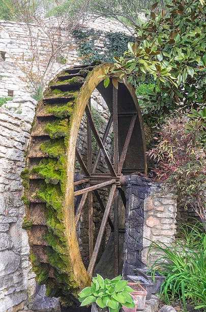 istock The wheel of old water mill. 546773864
