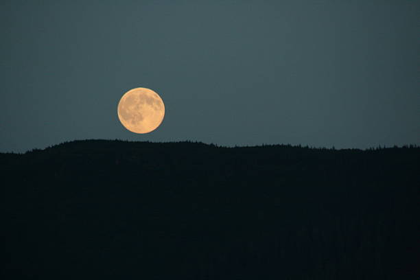 istock Moon Rising Over Northern Landscape 546776038