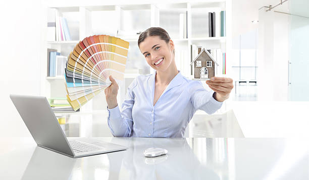smiling woman in office, concept for architecture and constructi