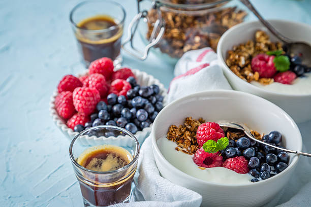 istock Breakfast - yogurt with berries and granola 546777362