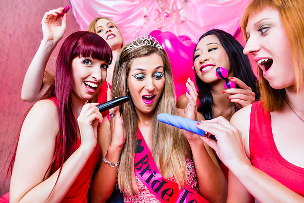 Women having bachelorette party with sex toys in night club Women having bachelorette party with sex toys in night club bachelor and bachelorette parties stock pictures, royalty-free photos & images