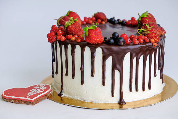istock birthday cake decorated by chocolate and berry 546780302