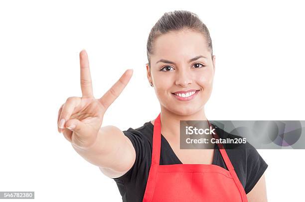 Portrait Of Smiling Attractive Female Merchandiser On Supermarke Stock Photo - Download Image Now