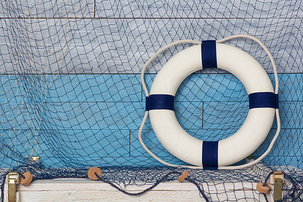 istock life buoy on wood background blue and white 546786322