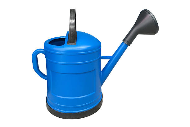 istock blue garden watering can isolated on white background 546787284