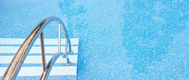 Swimming pool with stair at hotel stock photo