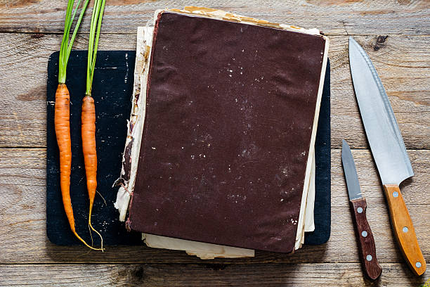 istock Vintage cook book and cooking utensils 546790168