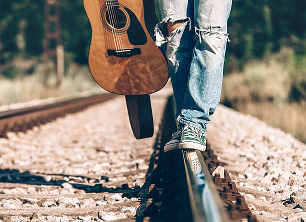 istock Close up image man legs on the railway 546794152
