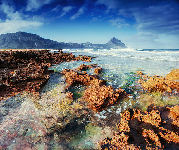 Picturesque rocky coast. Fantastic view of the nature reserve Dello Zingaro. Location cape San Vito. Mediterranean and Tyrrhenian sea. Sicilia, Italy, Europe.