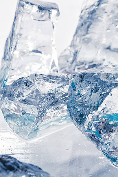 istock Pieces of ice on the table 546796116