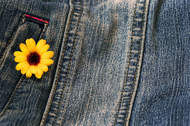 istock jeans texture with yellow flower 546797210