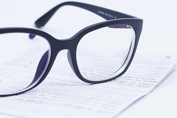 istock Finance Concepts, glasses with passbook as background 546797472