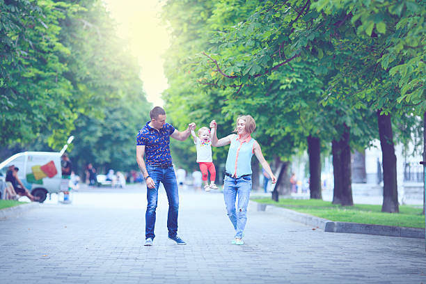 istock Happy family having weekend in summer park 546800388
