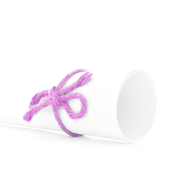 istock Handmade pink cord node tied on white message package isolated 546800672