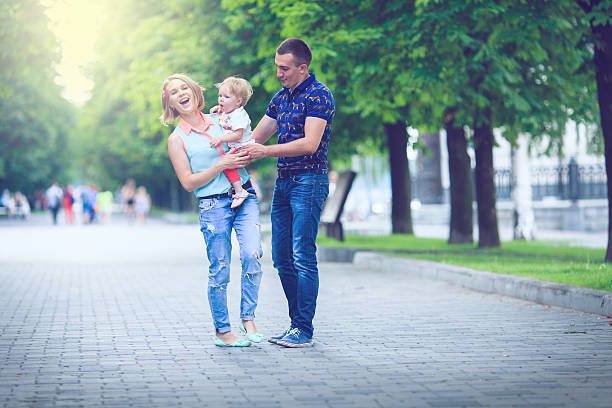 istock Happy family having weekend in summer park 546801166