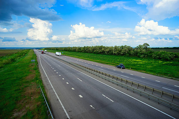 istock Cars driving on the road 546802130
