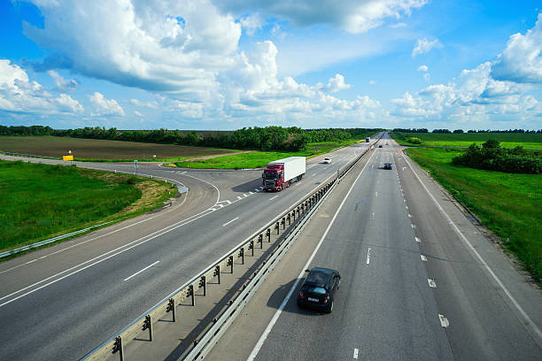 istock Cars driving on the road 546802552