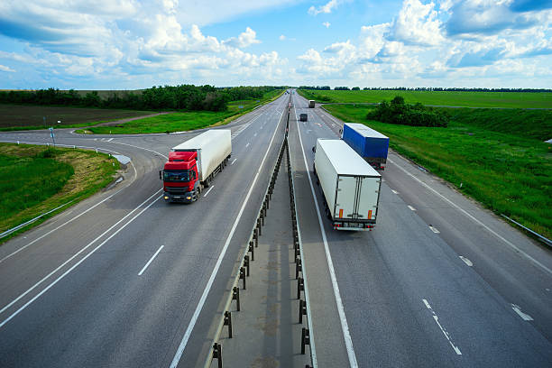 istock Trucks traveling on the road 546803016