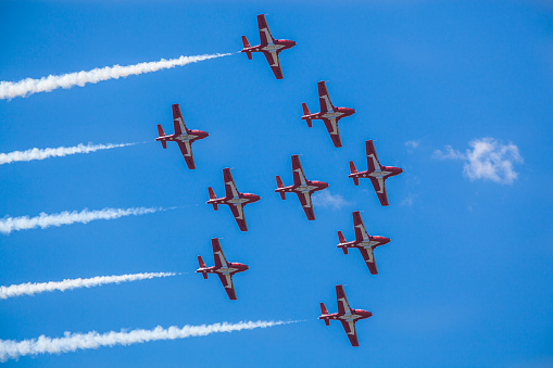Gatineau, Canada - June 30, 2016: The Wings over Gatineau Airshow is an airshow at the Gatineau Executive Airport. This image shows the Canadian Forces Snowbirds aerial demonstration team flying in the blue sky.